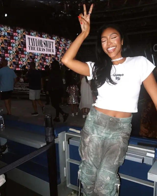 Tayshia Adams outfit in Réalisation, The Attico, and Amina Muaddi, 2023