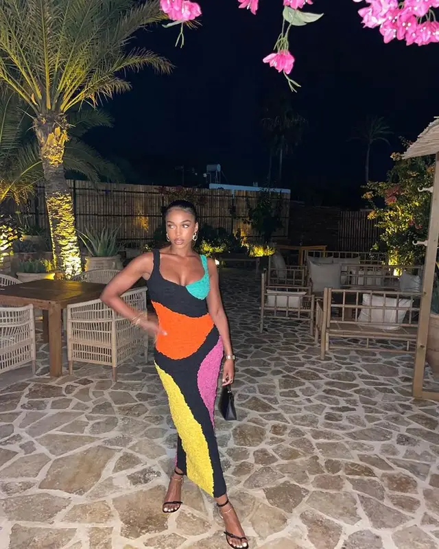 Lori Harvey outfit in Hermes, Loewe, and Mara Hoffman, 2023