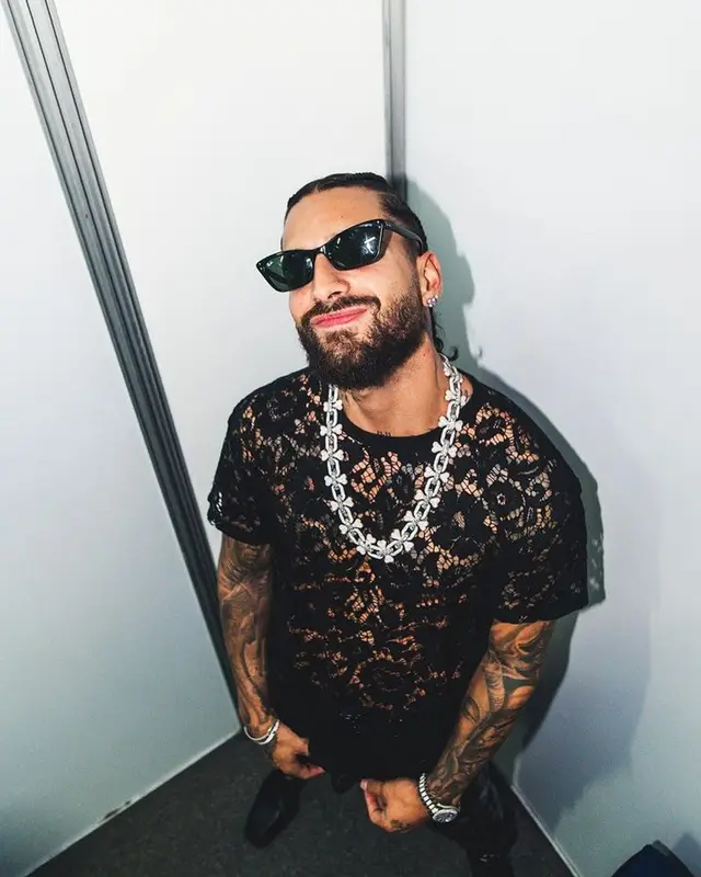 Maluma outfit in Valentino, Saint Laurent, and Ray-Ban, 2023
