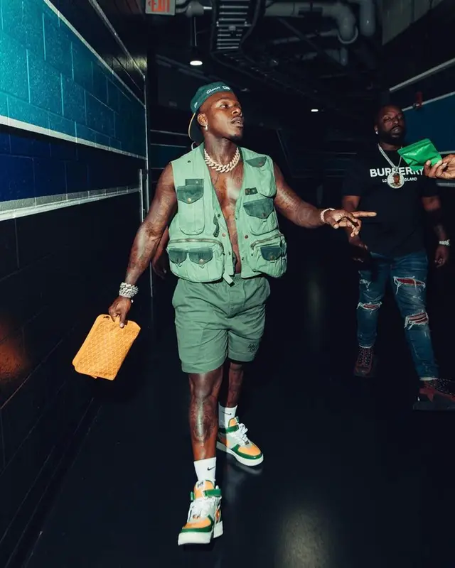 DaBaby outfit in Gallery Dept., New Era, and Nike, 2023