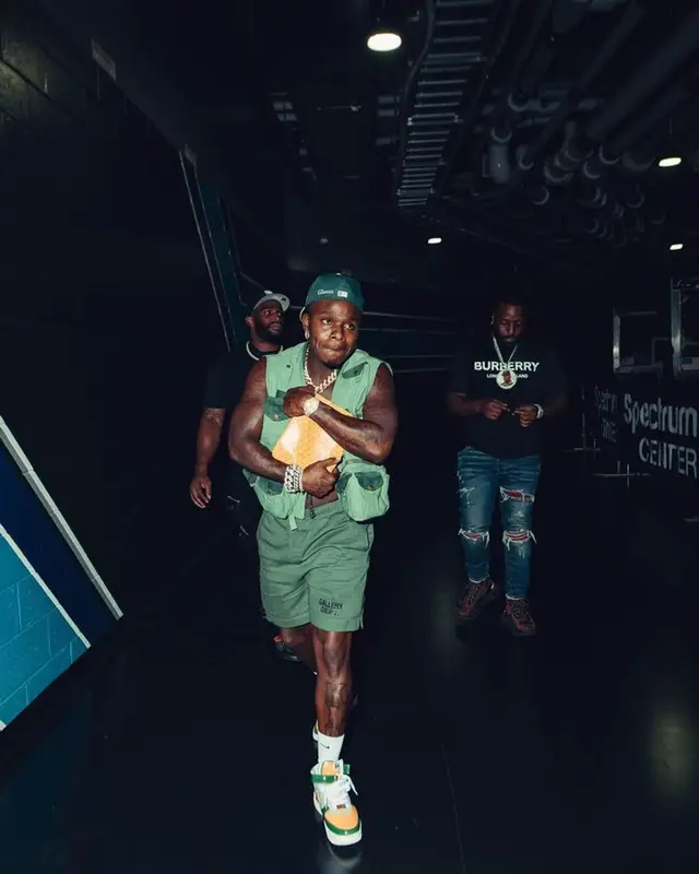 DaBaby outfit in Gallery Dept., New Era, and Nike, 2023