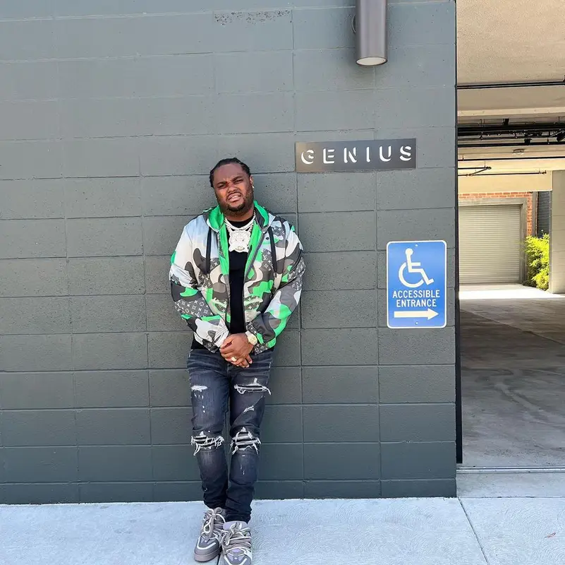 Tee Grizzley outfit in Louis Vuitton and Amiri, 2023