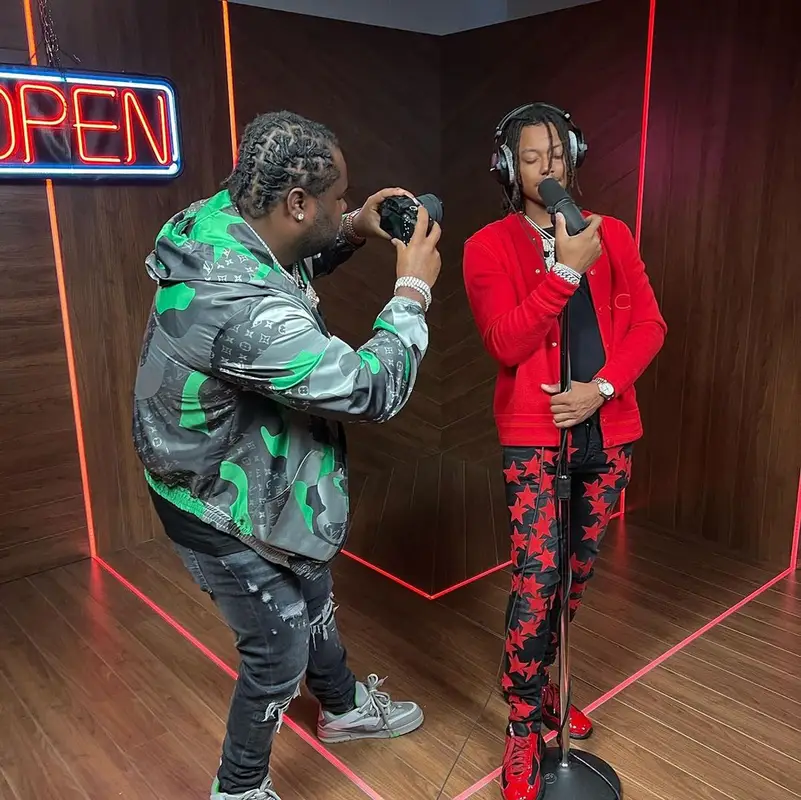 Tee Grizzley outfit in Louis Vuitton and Amiri, 2023