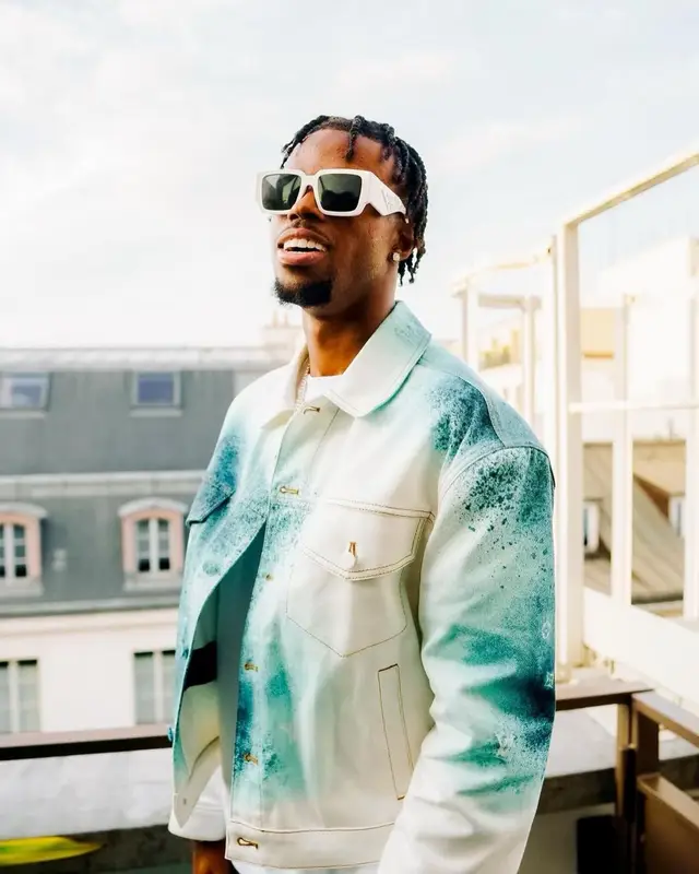 Carney Chukwuemeka outfit in Louis Vuitton, 2023