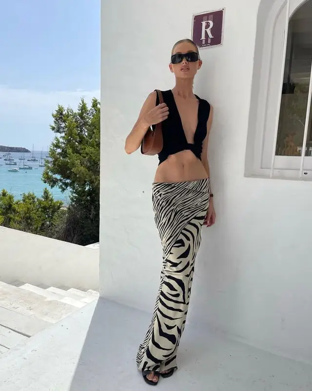 Elsa Hosk outfit in Jacquemus, Cartier, and The Row, 2023