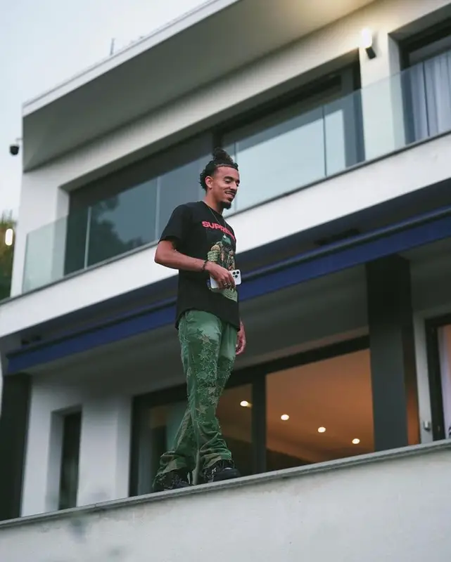 Malo Gusto outfit in Supreme, Mnml, and Louis Vuitton, 2023