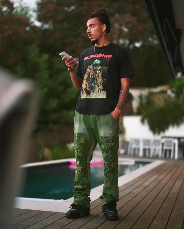 Malo Gusto outfit in Supreme, Mnml, and Louis Vuitton, 2023