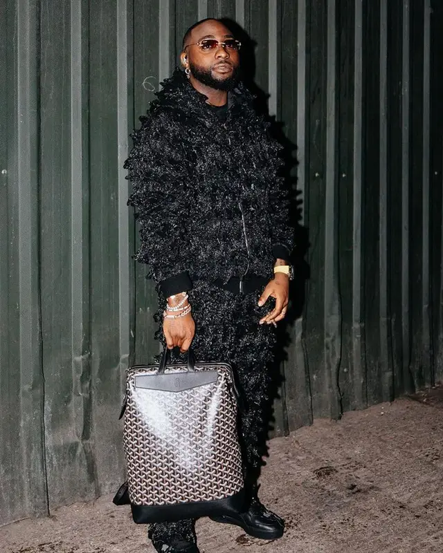 Davido outfit in Marc Jacques Burton, Nike, and Goyard, 2023