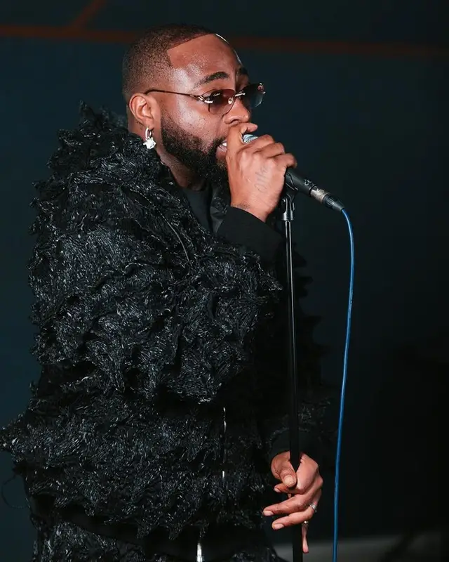 Davido outfit in Marc Jacques Burton, Nike, and Goyard, 2023