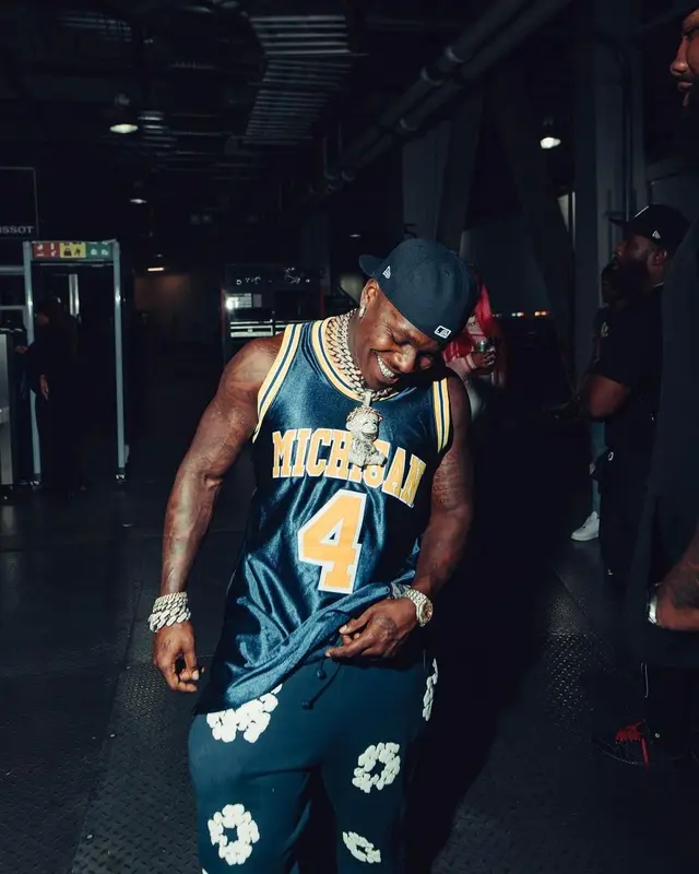 DaBaby outfit in Mitchell & Ness, Readymade, and New Era, 2023