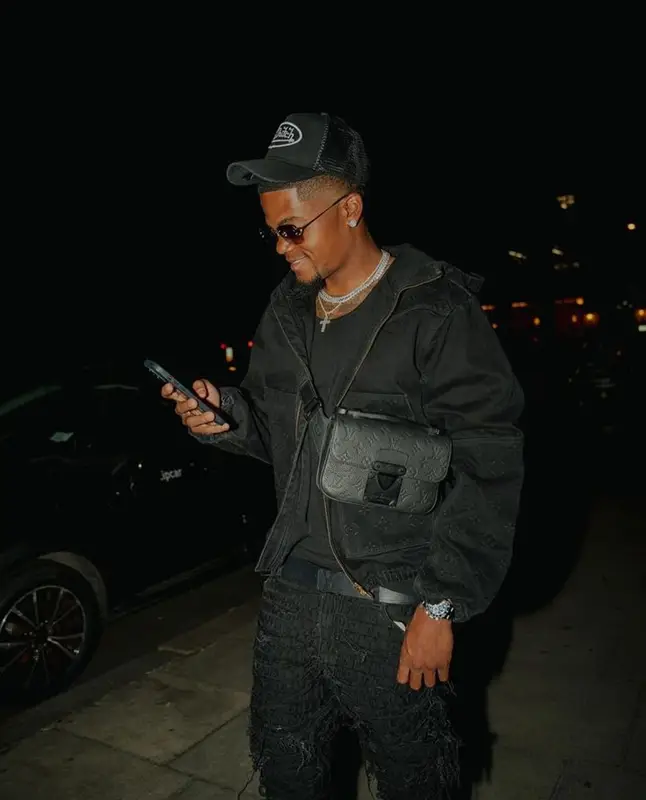 Leon Bailey outfit in Louis Vuitton and Von Dutch, 2023