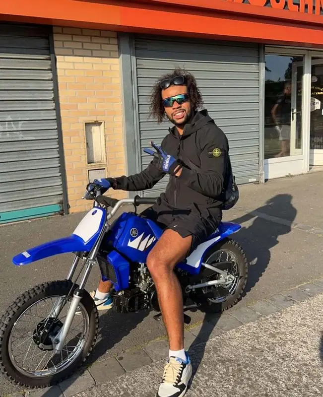 Gambi outfit in Stone Island, Nike, and Travis Scott Merch, 2023