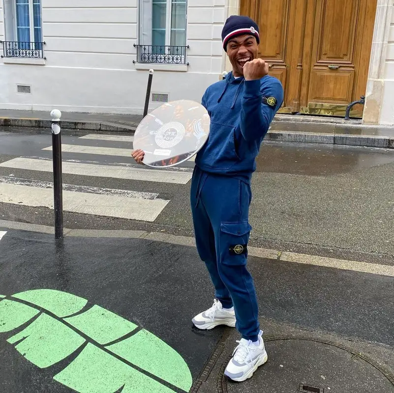 Gambi outfit in Stone Island, Dior, and Moncler, 2023