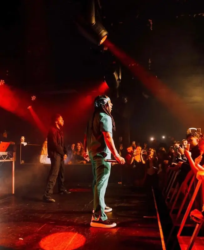 Jacquees outfit in Issey Miyake, Alexander McQueen, and Bottega Veneta, 2023