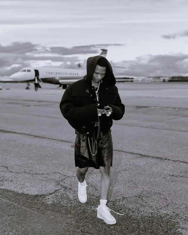 Wizkid outfit in Amiri, Nike, and Bottega Veneta, 2023