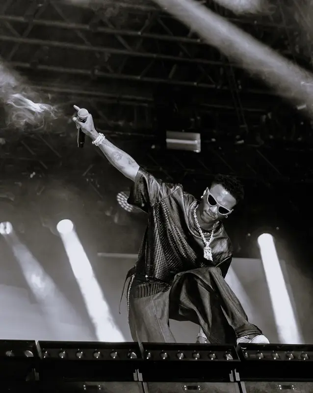 Wizkid outfit in Amiri, Nike, and Bottega Veneta, 2023
