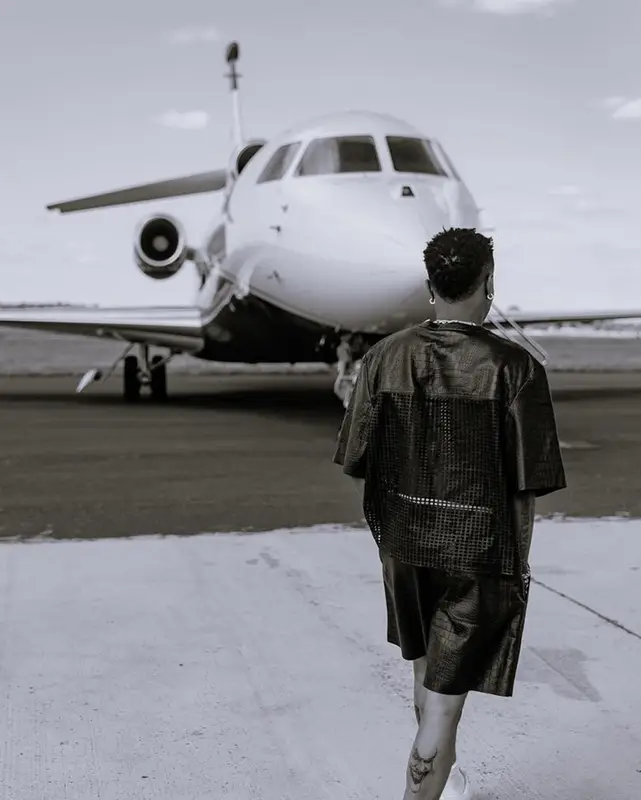 Wizkid outfit in Amiri, Nike, and Bottega Veneta, 2023