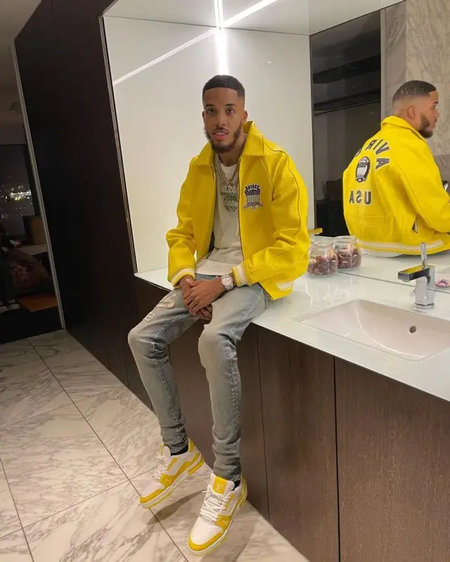 M24 outfit in Avirex, Amiri, and Louis Vuitton, 2023