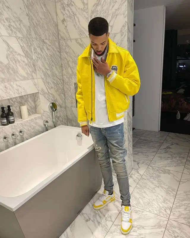 M24 outfit in Avirex, Amiri, and Louis Vuitton, 2023