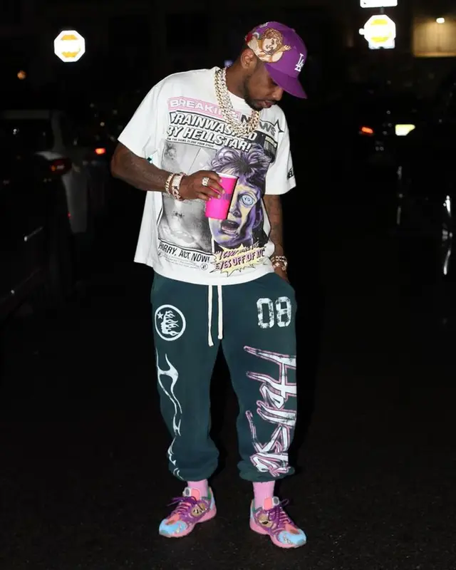 Fabolous outfit in Hellstar, Saucony, and Jon Stan, 2023