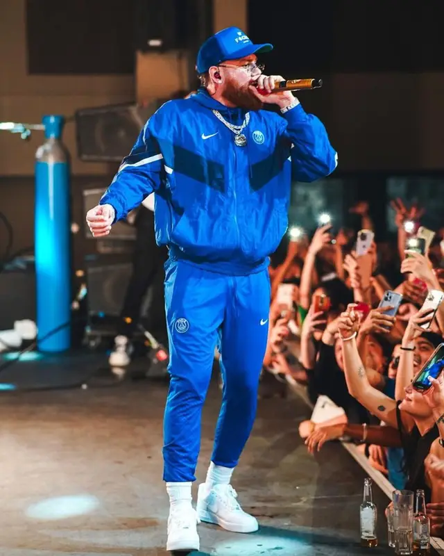 Miky Woodz outfit in Nike, Cartier, and Paris Saint-Germain, 2023