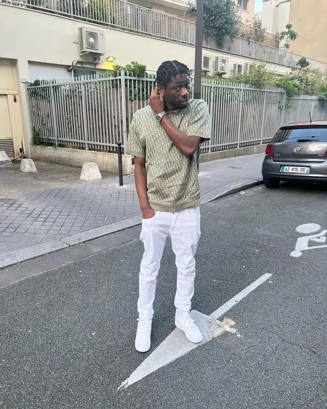Tiakola outfit in Dior, Amiri, and Nike, 2023
