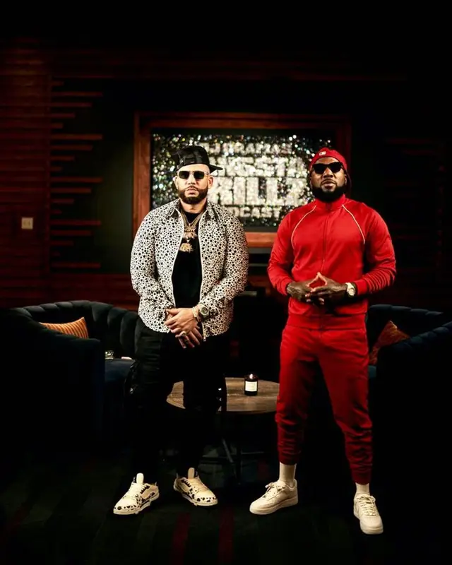 DJ Drama outfit in Louis Vuitton, Dior, and Amiri, 2023