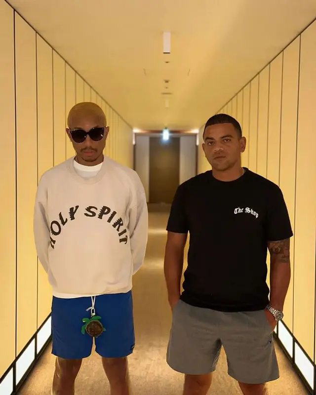 Pharrell Williams outfit in Kanye West Merch, Noah, and Louis Vuitton, 2023
