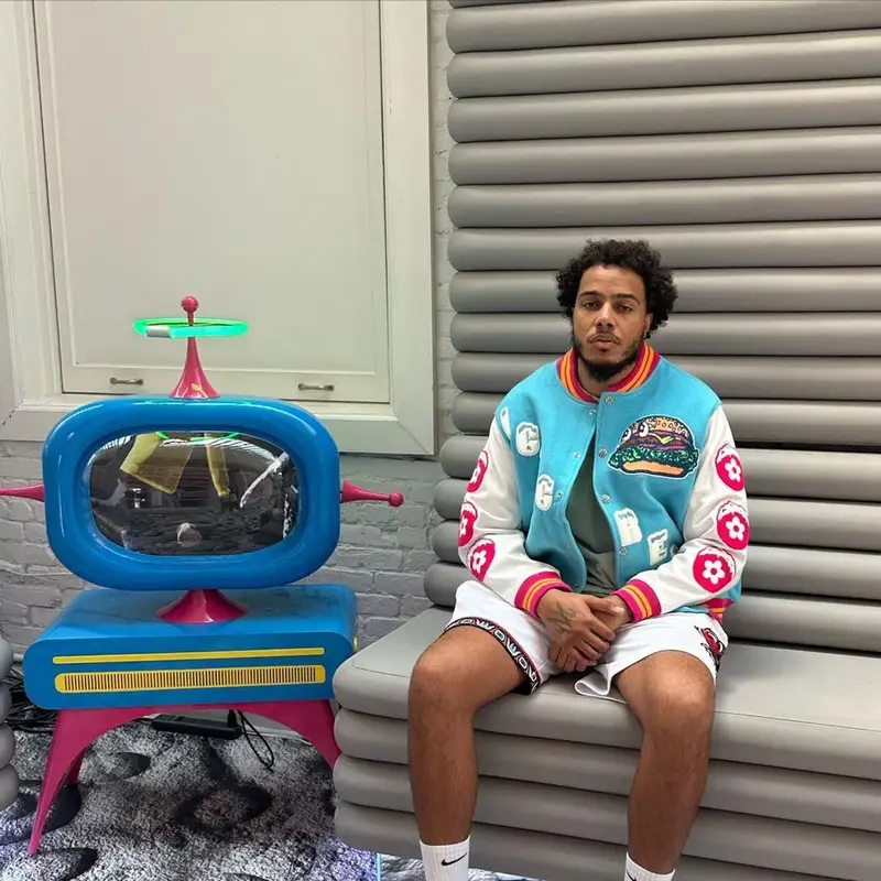 AJ Tracey outfit in Vandy, Mitchell & Ness, and IceCream, 2023