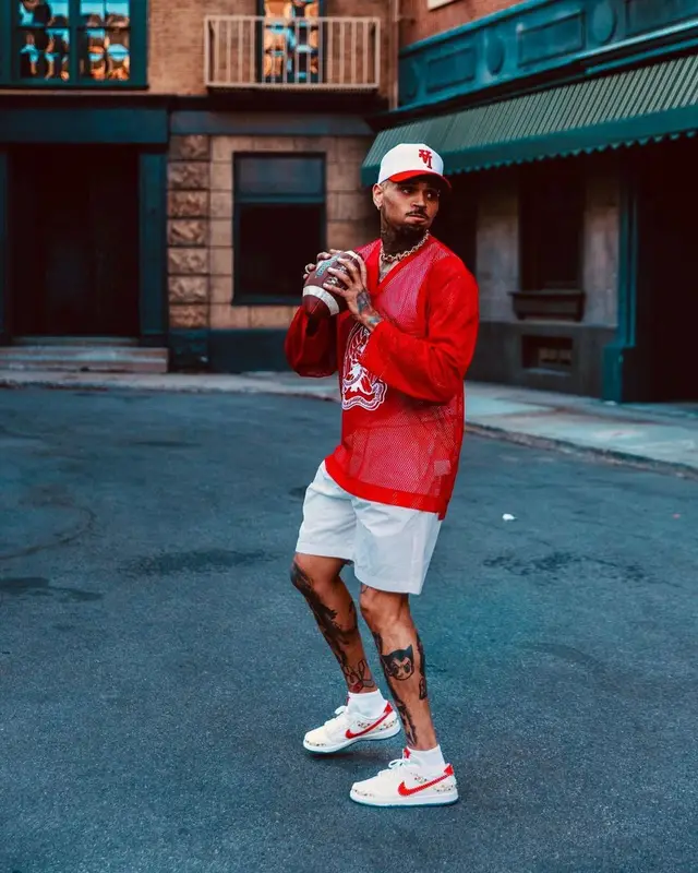 Chris Brown outfit in 2Pac Merch, Kill the Hype, and Denim Tears, 2023