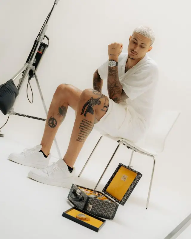 Kyle Kuzma outfit in Louis Vuitton and Goyard, 2023