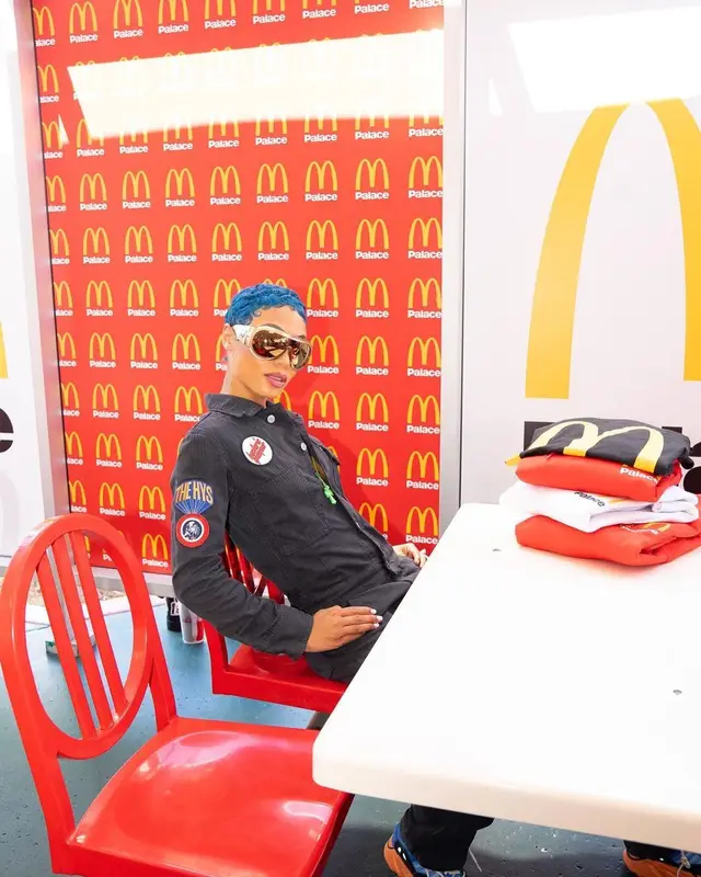 Coi Leray outfit in Palace, Adidas, and McDonald's Merch, 2023