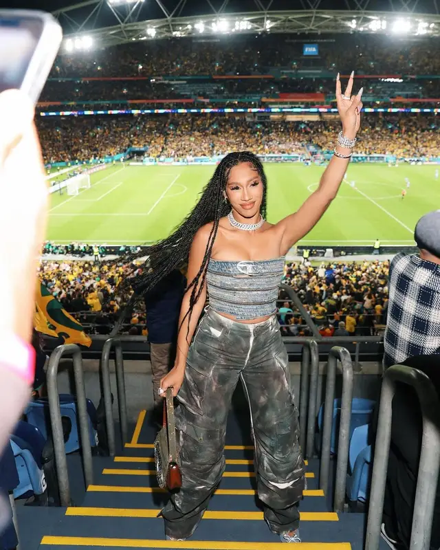 Bia outfit in Diesel, The Attico, and Amina Muaddi, 2023