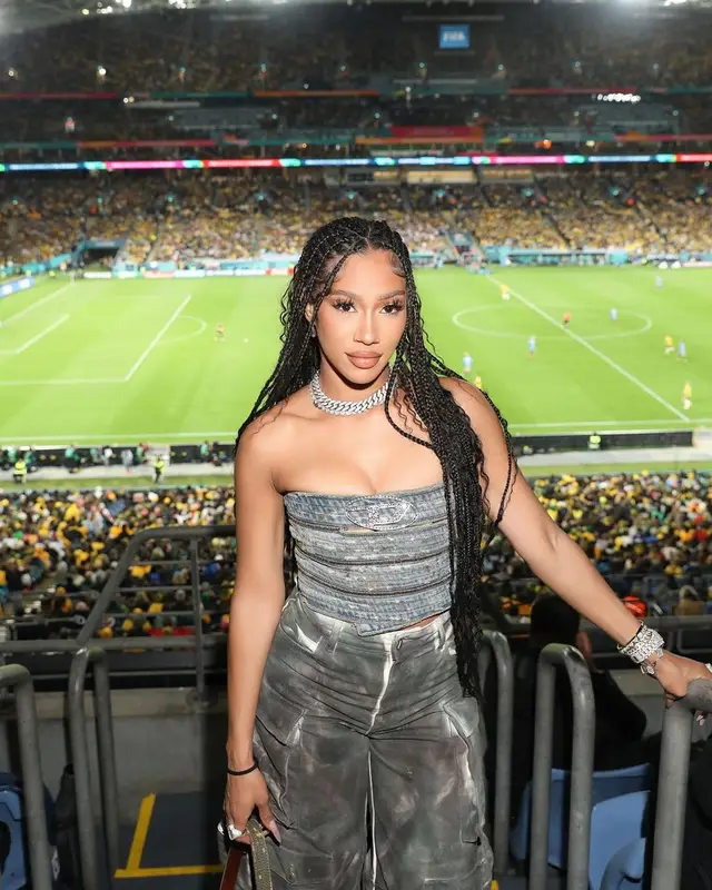 Bia outfit in Diesel, The Attico, and Amina Muaddi, 2023
