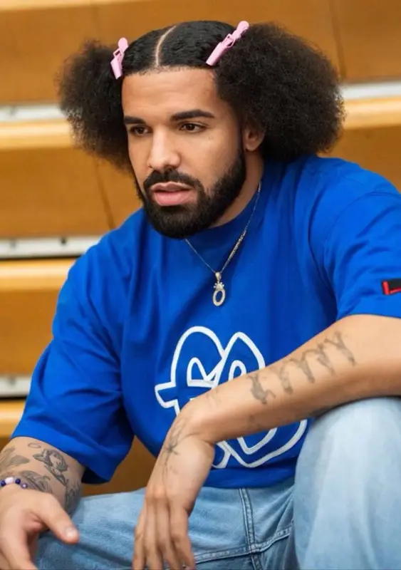 Drake outfit in Fubu, Acne Studios, and No Name, 2023