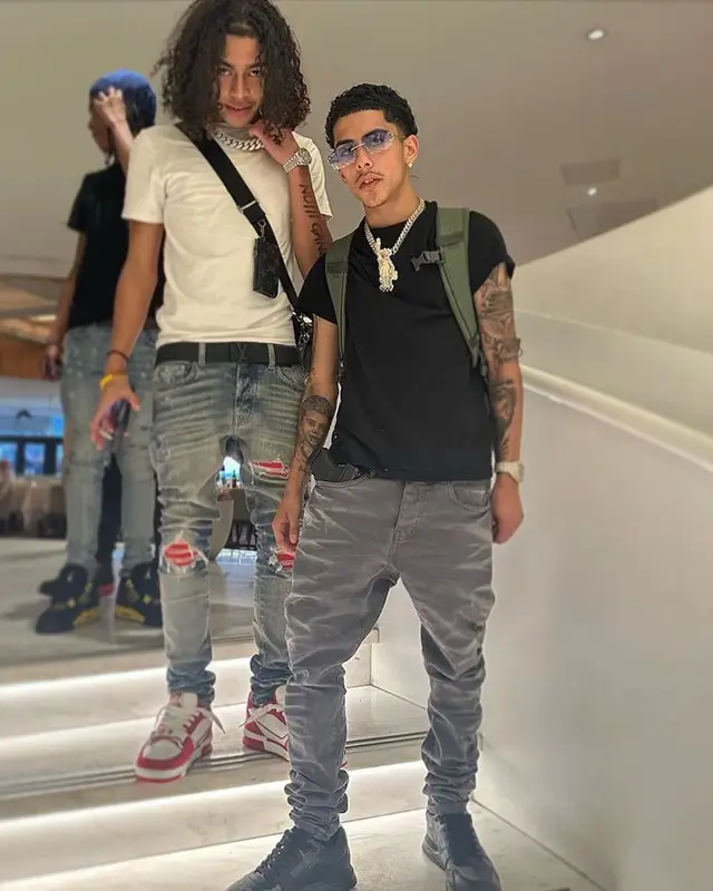 J.I. outfit in Purple Brand, Dior, and Cartier, 2023