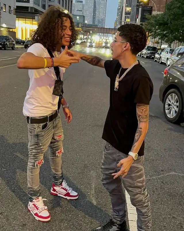 J.I. outfit in Purple Brand, Dior, and Cartier, 2023