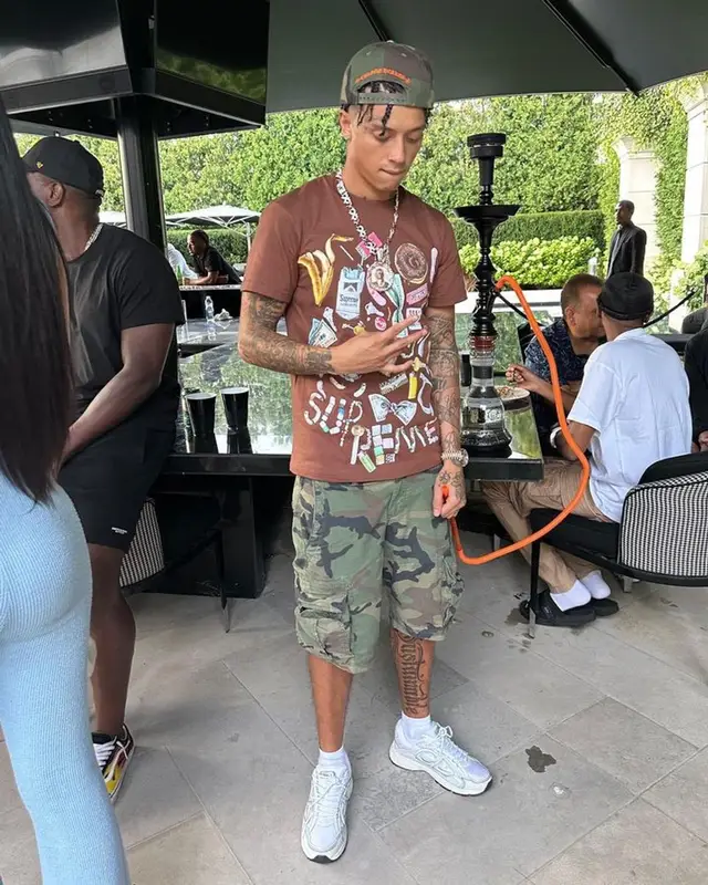 Central Cee outfit in Supreme, GAP, and Chrome Hearts, 2023