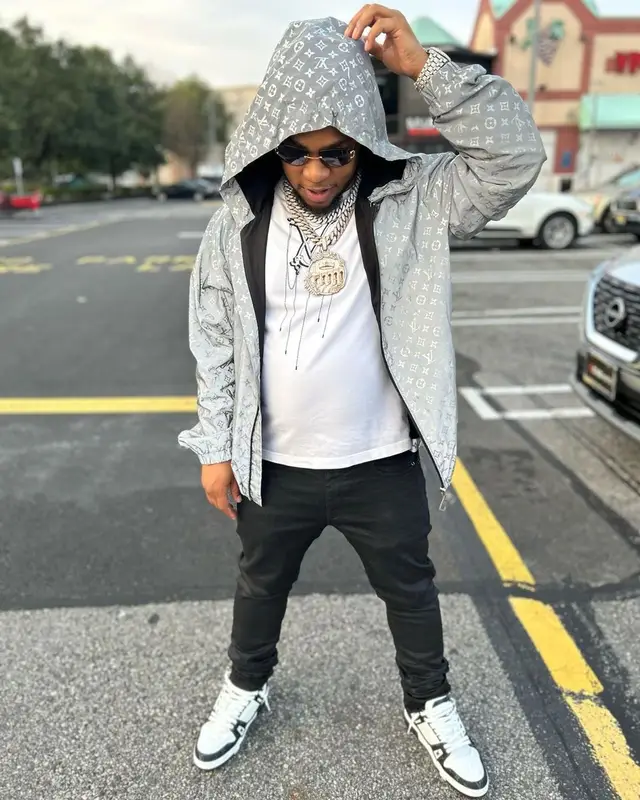 Don Q outfit in Louis Vuitton, Amiri, and Cartier, 2023