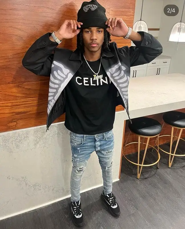 Lil Darius outfit in Celine, Amiri, and Supreme, 2023