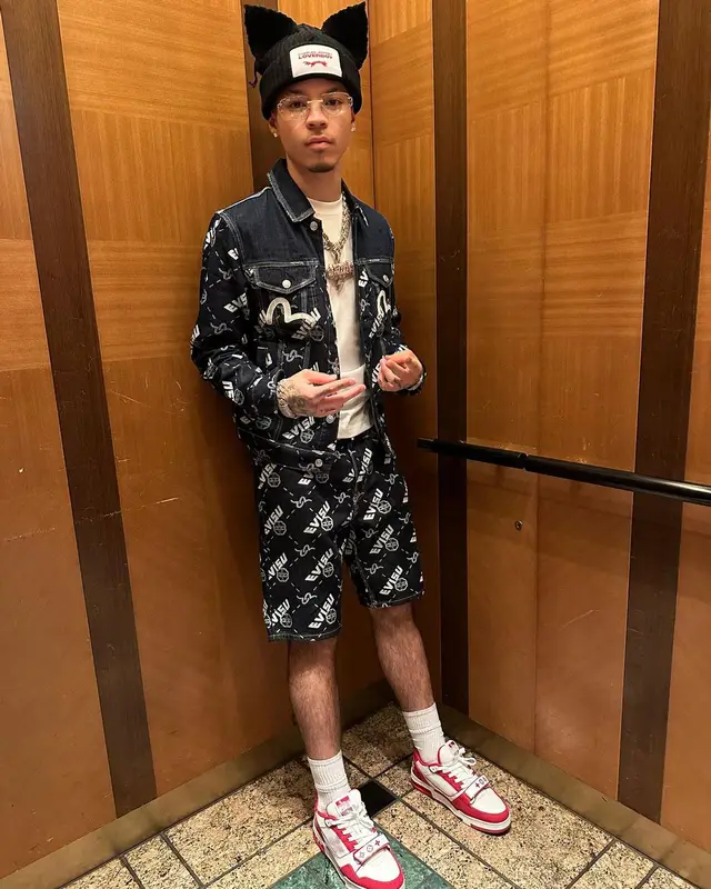 Lil Mosey outfit in Evisu, Louis Vuitton, and Loverboy by Charles Jeffrey, 2023