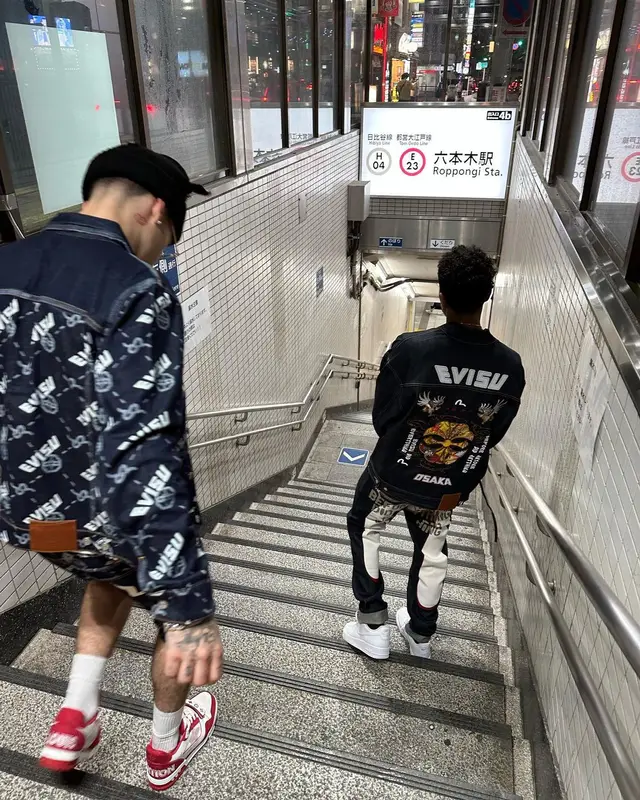 Lil Mosey outfit in Evisu, Louis Vuitton, and Loverboy by Charles Jeffrey, 2023