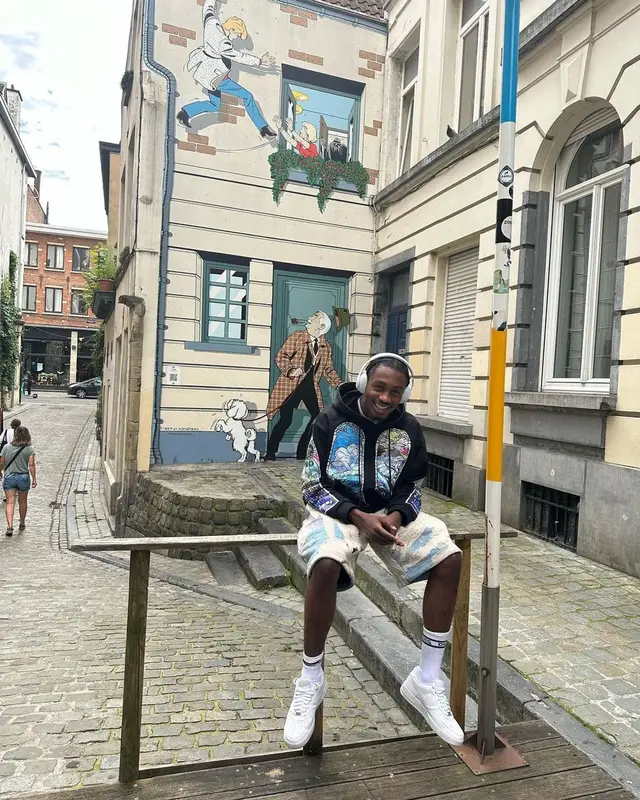 Lil Tjay outfit in Who Decides War, Amiri, and Goyard, 2023