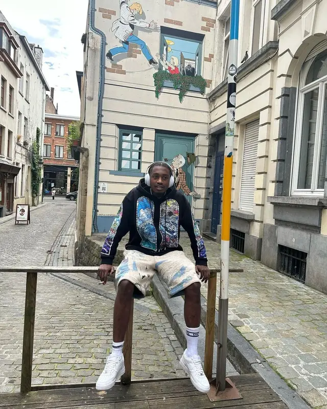 Lil Tjay outfit in Who Decides War, Amiri, and Goyard, 2023