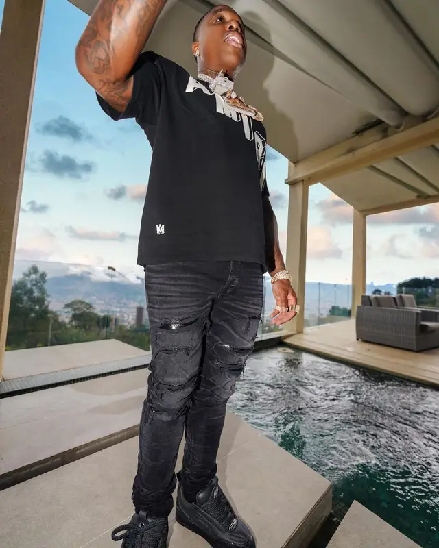 BandMan Kevo outfit in Amiri, Louis Vuitton, and Prada, 2023
