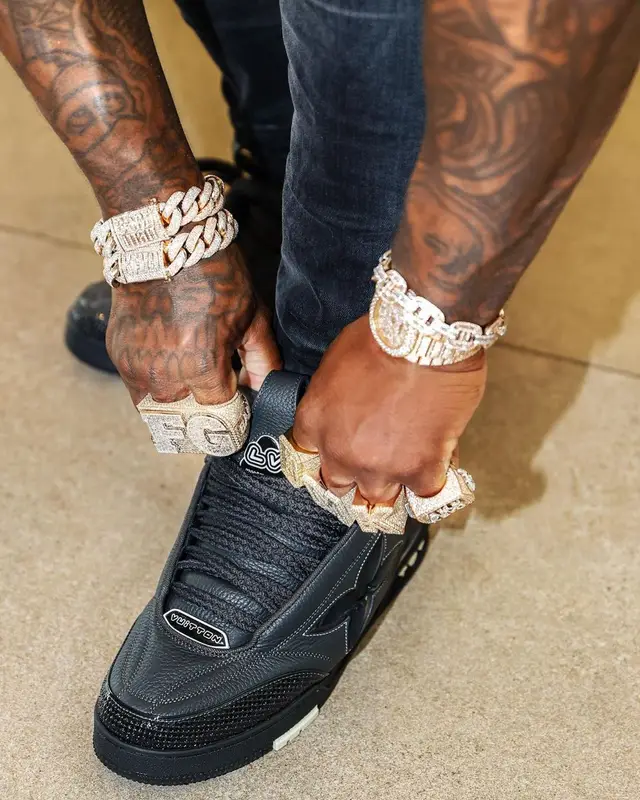 BandMan Kevo outfit in Amiri, Louis Vuitton, and Prada, 2023
