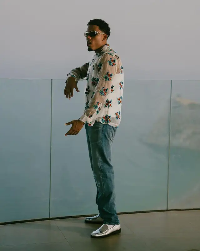 Myke Towers outfit in Bode, Loewe, and Sebago, 2023
