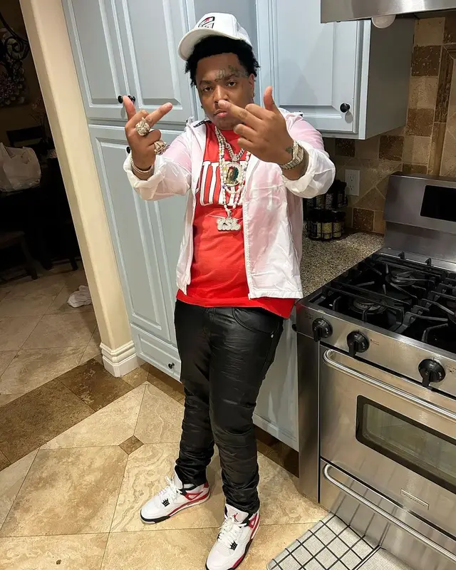 Lil Gotit outfit in Purple Brand and Jordan, 2023