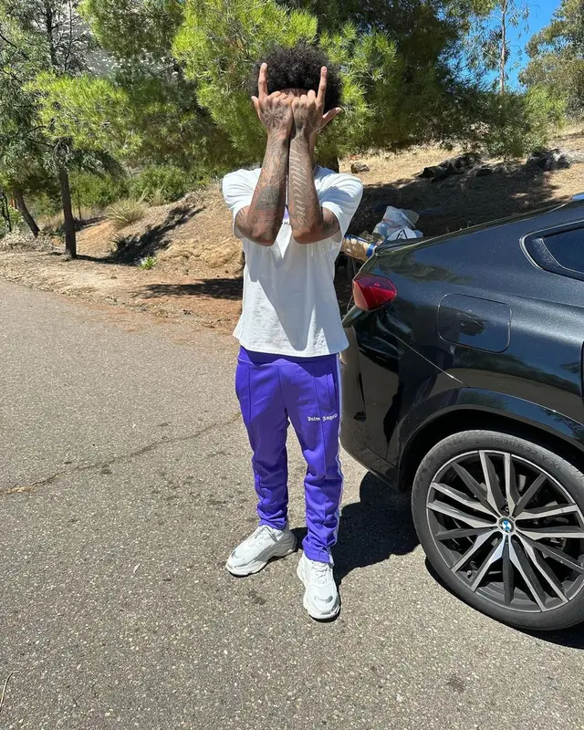 Mikey outfit in Palm Angels and Balenciaga, 2023