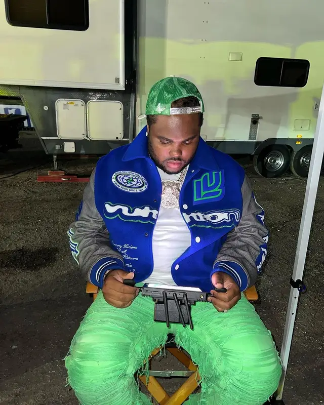 Tee Grizzley outfit in Louis Vuitton and Valabasas, 2023